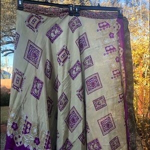 Brand is Darn Good Yarn. Double layer silk wrap skirt. Two layers of fabric